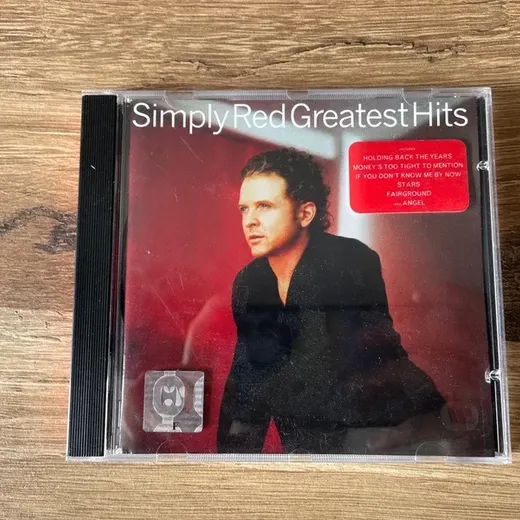 CD simply red greatest hits
