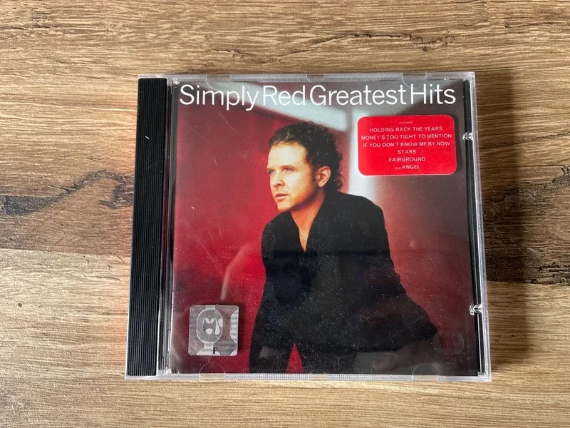CD simply red greatest hits